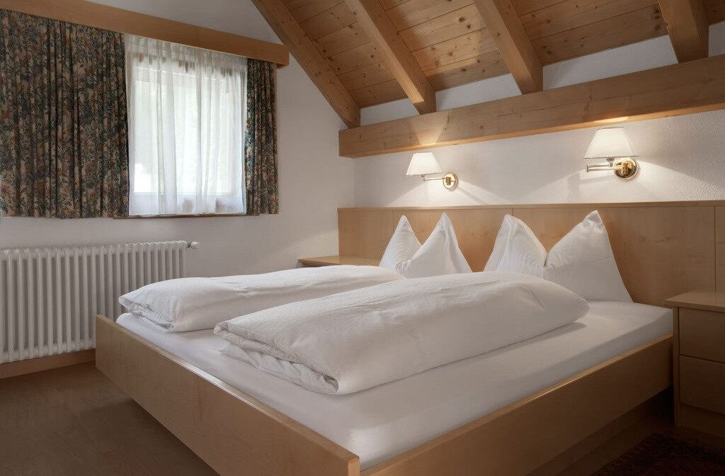 Skijanje u Italiji, Alta Badia, Apartmani Chalet Pinis, spavaća soba