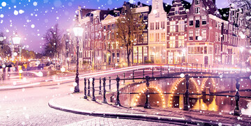 Amsterdamski kanali u predvečer dok snijeg pada, putovanje u Amsterdam, Mondo travel